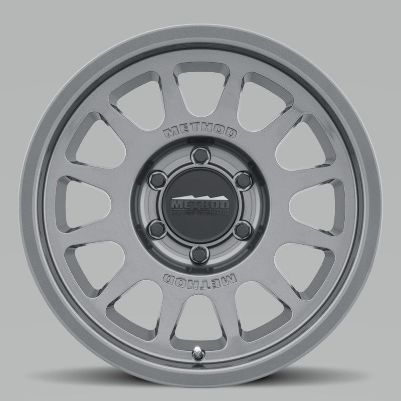 Method MR703 17×7.5 +50mm Offset 6×130 84.1mm CB Gloss Titanium Wheel | MR70377563850