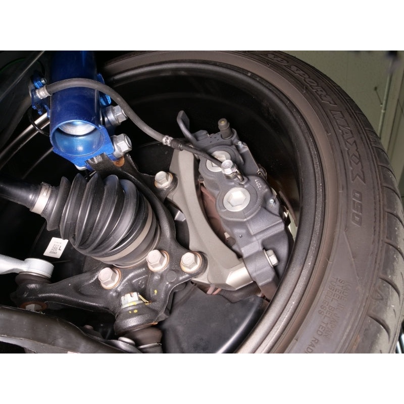 Cusco 23-25 Toyota GR Corolla Light Weight Front Brake Caliper Bracket – Billet Aluminum